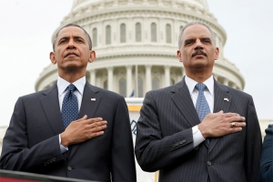 U.S. President Obama and Attorney General Holder attend the National Peace Officers Memorial Service at the Capitol in Washington